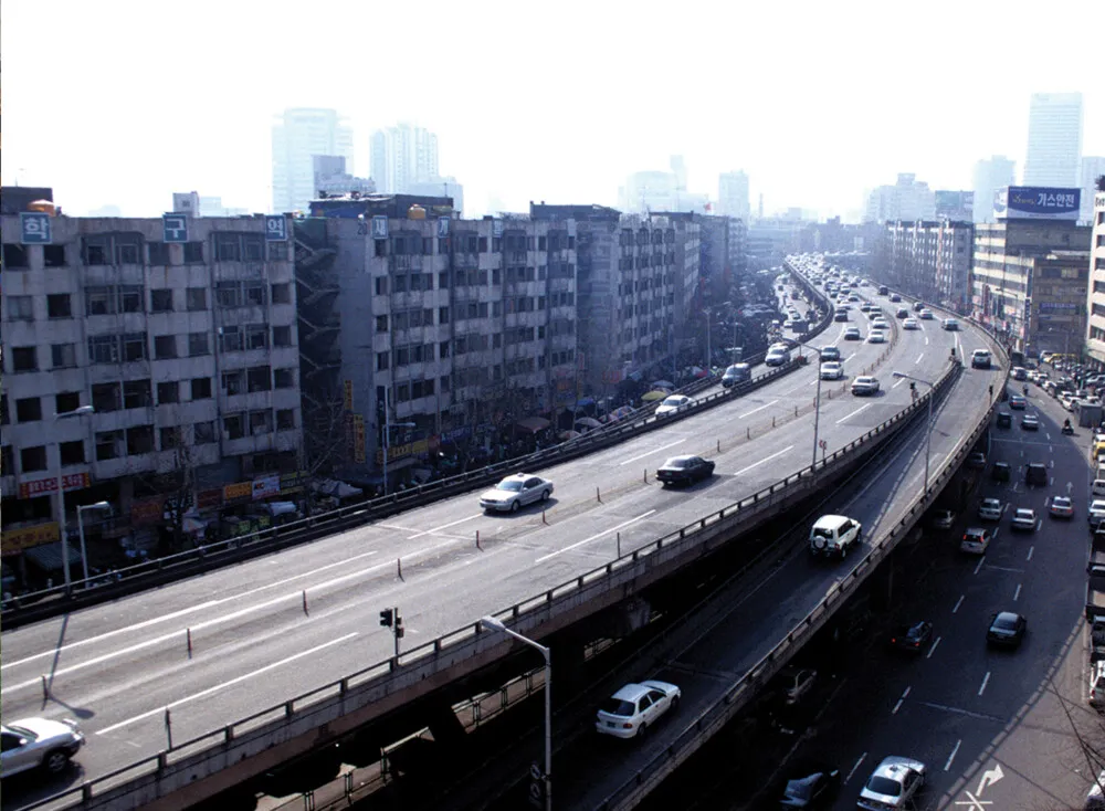 The Cheonggyecheon elevated expressway in Seoul before removal, a multi-lane highway dominating the urban landscape